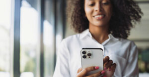 person using an iPhone