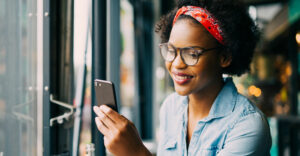 woman reading a text marketing message